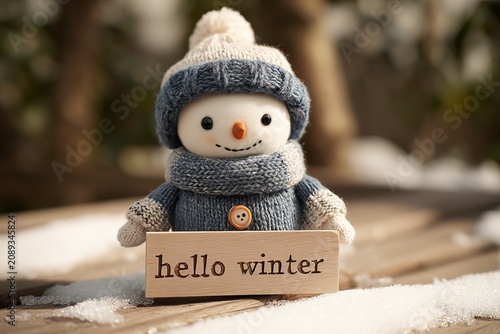 Charming snowman welcomes the season with a cozy scarf and cheerful smile as snow blankets the outdoor scene on a crisp winter day