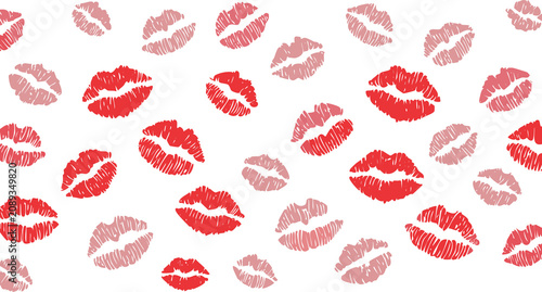 Red and pink lipstick kiss prints isolated on white background.