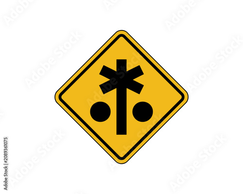 Yellow diamond shaped warning sign indicating a railway intersection crossing ahead with symbol representing railway