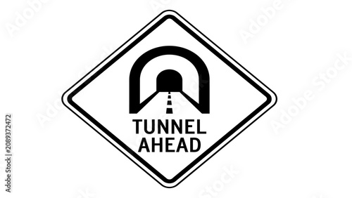 Konstfotografi Tunnel sign warns drivers of an upcoming subterranean passageway on the highway ahead of them