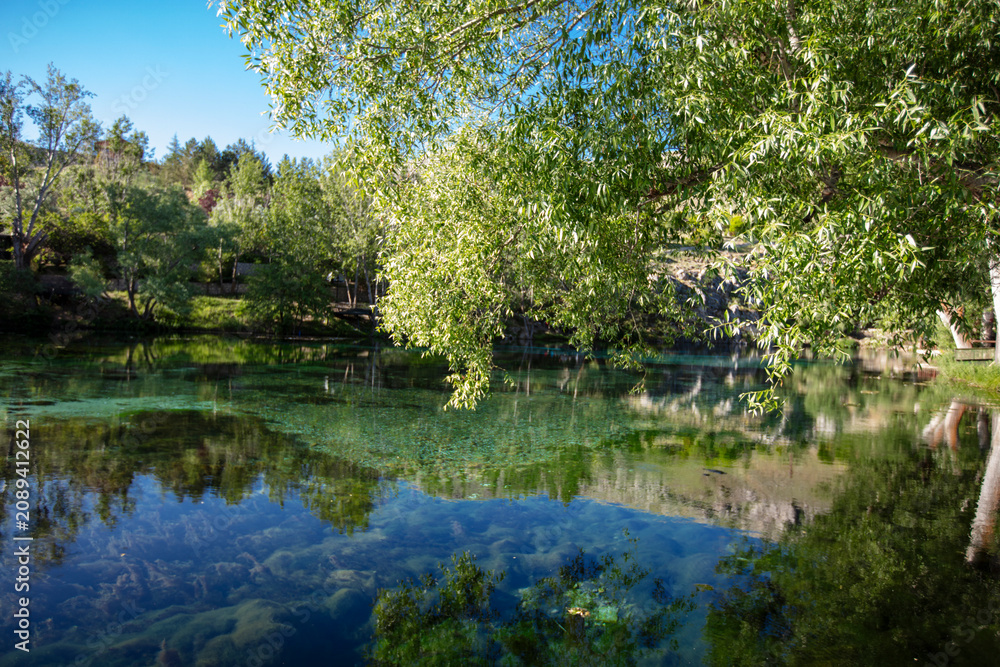 Fototapeta premium Crystal Clear Waters of Gokpinar Lake in Gurun Sivas Turkey Surrounded by Natural Landscape