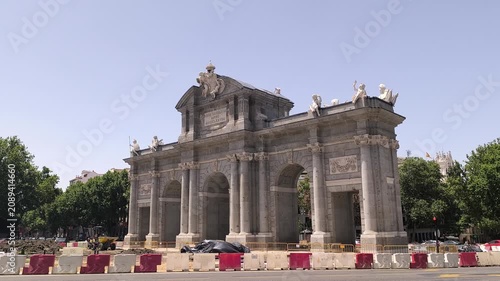 Puerta de Alcala Triumphal Arch Monument with Street Traffic Madrid Spain Handheld View