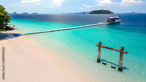 Принти на полотні Empty twin wooden swing on Madam beach of Nyaung Oo Phee Island in Myanmar or Burma