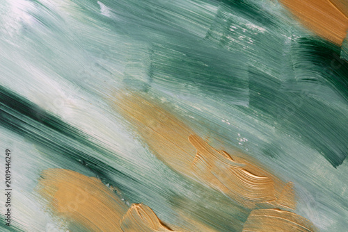 Elegant emerald green abstract acrylic background featuring expressive gold brush strokes and rich painterly texture. Modern luxury backdrop ideal for branding, packaging, editorial design and premium