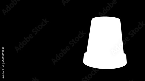 Red revolving emergency beacon light on dark gray background