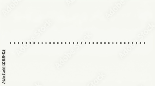 Horizontal Line of Black Dots on Light Background