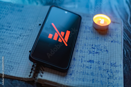 Ukraine energy crisis: candlelight studying with no phone connection