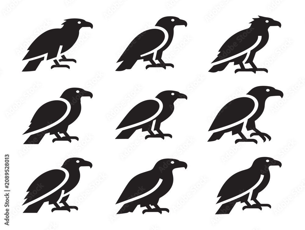 Obraz premium Set of solid black raptor silhouettes featuring eagle icons in a minimalist style