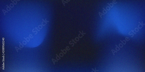 фотографія Abstract dark blue background with grainy texture and soft light blurs