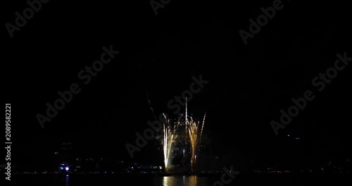 Celebration greeting Beautiful fireworks colorful fireworks on the beach for abstract background , anniversary, celebration , 4th independence day and new year background or wallpaper.