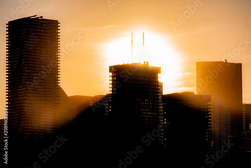 Photography sunset over the city on a summer day