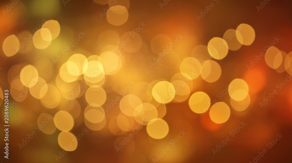 Fototapeta premium Colorful glowing bokeh lights in warm orange and yellow tones
