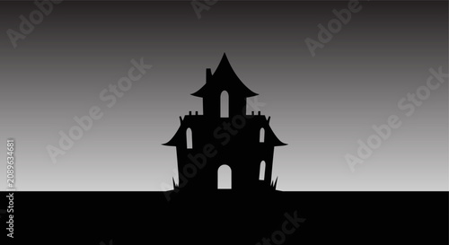 Obraz na płótnie Haunted House Silhouette with Spooky Architecture and Dark Sky Background