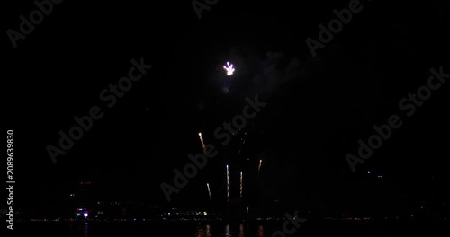 Celebration greeting Beautiful fireworks colorful fireworks on the beach for abstract background , anniversary, celebration , 4th independence day and new year background or wallpaper.