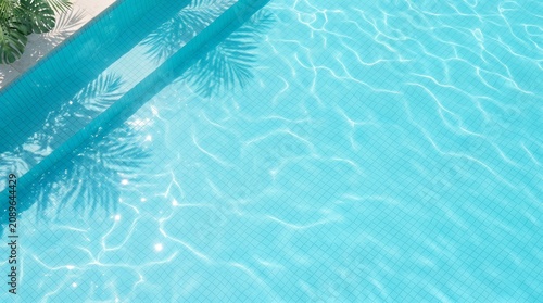 Turquoise Pool Water with Sunlight Reflections