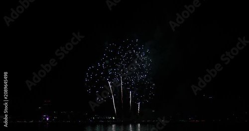 Celebration greeting Beautiful fireworks colorful fireworks on the beach for abstract background , anniversary, celebration , 4th independence day and new year background or wallpaper.