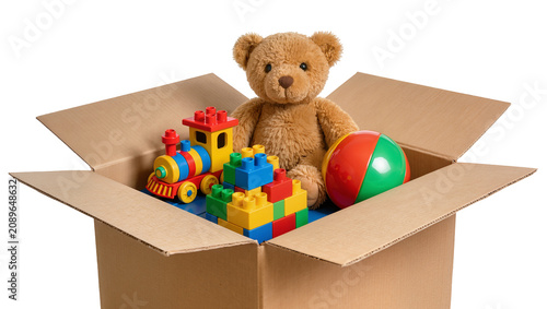 Canvas Print Isolated open cardboard box filled with various colorful children's toys ready f