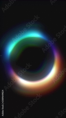 Seamless Loop of Softly Blurred Rainbow Prism Ring Rotating on Dark Background