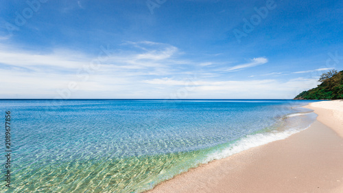 Beautiful tropical beach and sea with blue sky background for travel and vacation