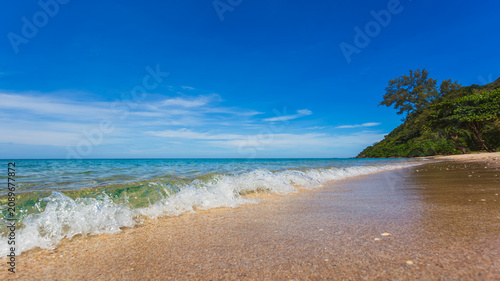 Beautiful tropical beach and sea with blue sky background for travel and vacation