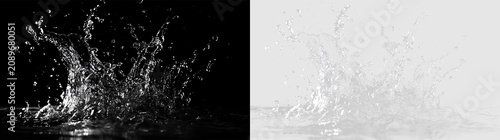 Bild auf Leinwand Water splash captured in motion during daylight over a clear surface with drople