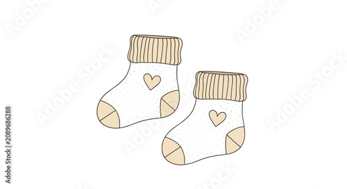 Cute pair of knitted baby socks in cream and tan colors decorated with small heart motifs on a white background for infant apparel gifts.