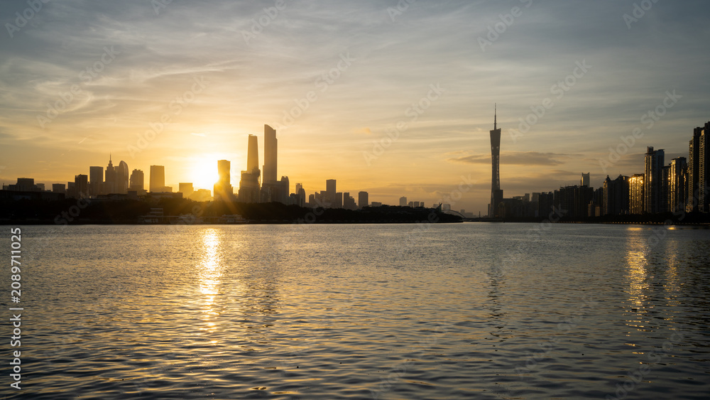 Obraz premium Riverside urban skyline sunrise scenery, Guangzhou China