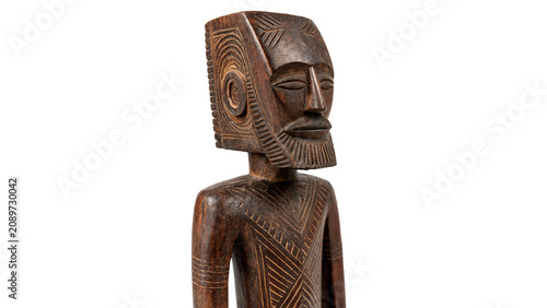 Fényképezés Traditional primitive wooden carved human figurine sculpture isolated on a trans