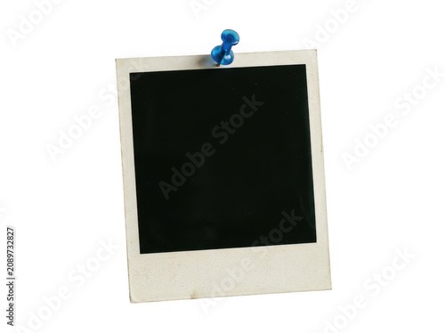Blank vintage Instant photo frame with a blue push pin