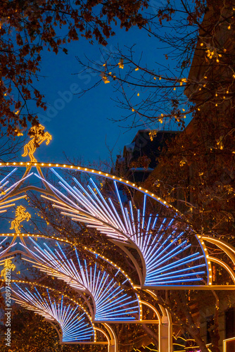 Fotografie The illuminated archways at night on Zhongyang Street