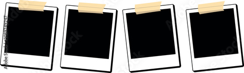 Tableau sur toile Collection of four blank instant photo frames held by adhesive tape isolated on