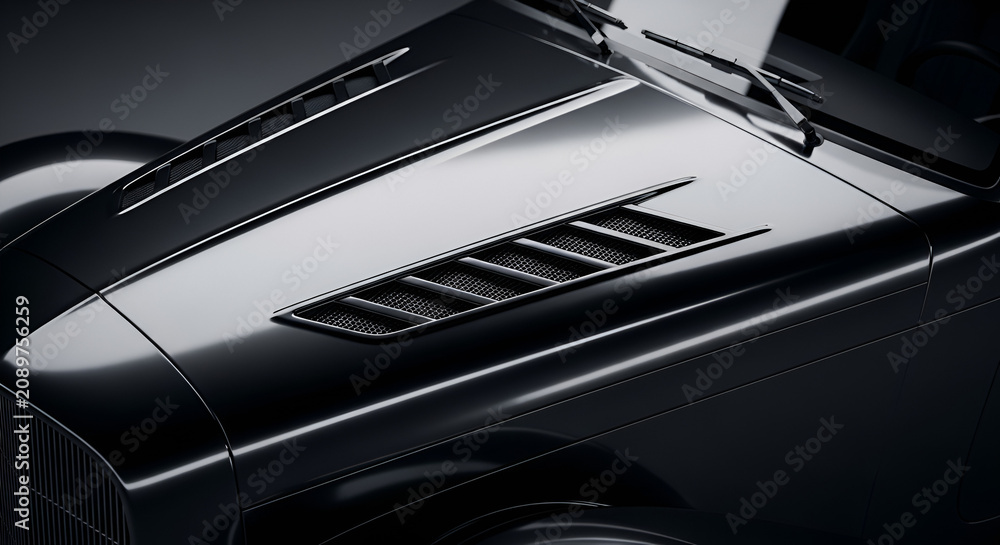 Fototapeta premium Glossy black vintage car hood close-up, elegant auto detail, luxurious classic automotive design