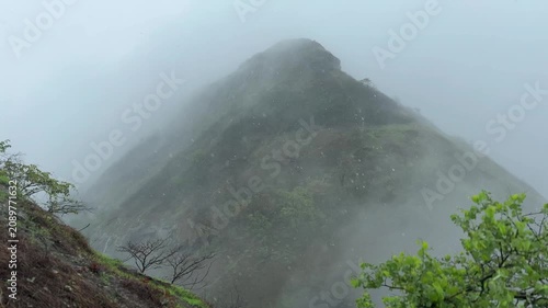  Sondai Fort surrounded by green hills and rain clouds in 4K 