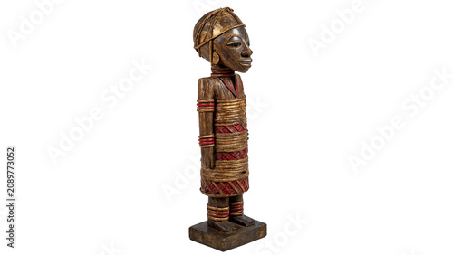 фотографія Traditional primitive wooden carved human figurine sculpture artifact isolated o