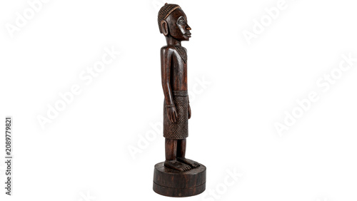 Φωτογραφία Traditional primitive wooden carved human figurine sculpture artifact isolated o
