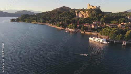 Aerial Sunset View of Open Boat Near Angera Castle on Lake Maggiore