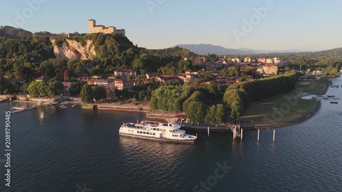 Aerial View of Lake Maggiore Ferry with Angera Castle at Golden Hour