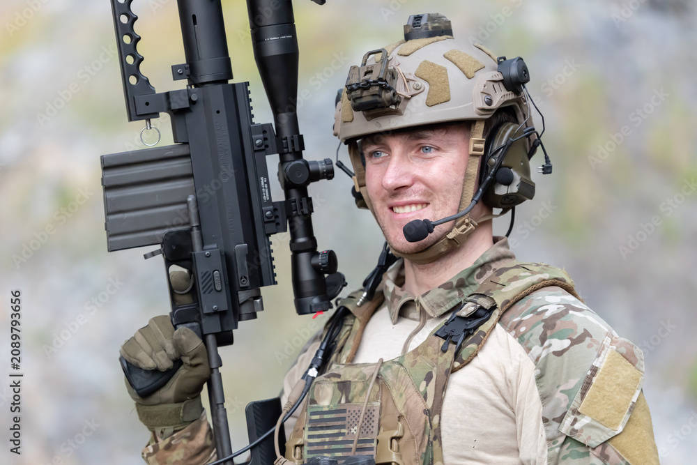 Fototapeta premium Military participate in a patrol in a rocky terrain