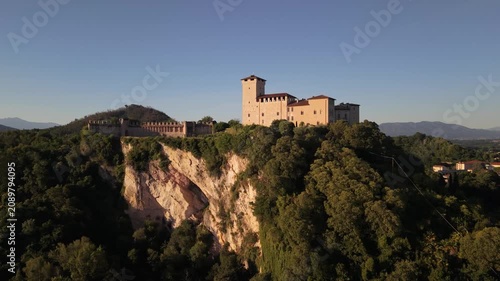Golden Hour Drone Shot of Angera Castle Above Lake Maggiore Village