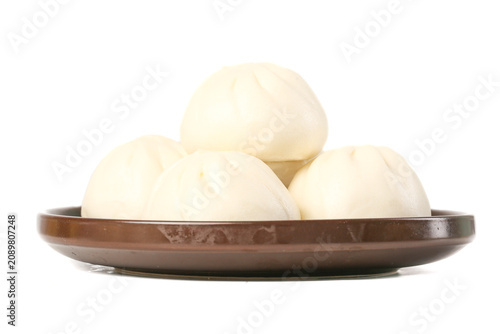 Foto Steamed Cantonese Pork Buns on Brown Plate