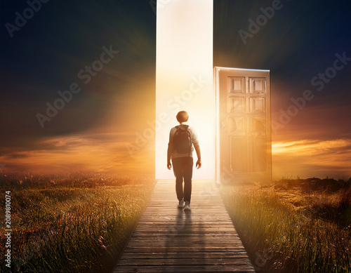 Lonely figure in cloudy tunnel, concept of entrance to the afterlife. heaven afterlife concept