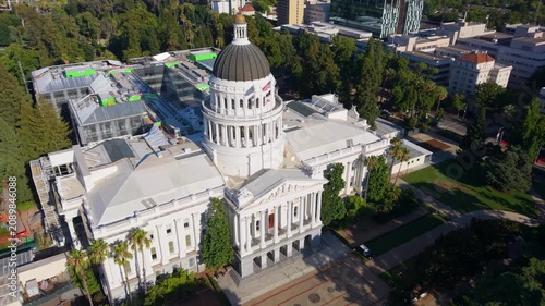 Aerial perspective shows west side of California State Capitol and ongoing annex construction to the east in Sacramento, CA.