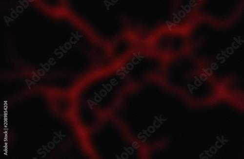 Konstfotografi Mysterious glowing red silhouette against dark background