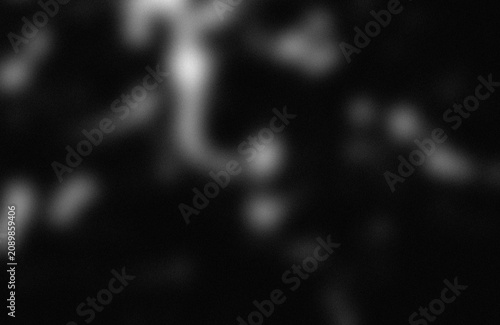 Bild auf Leinwand Blurry abstract shapes against dark background