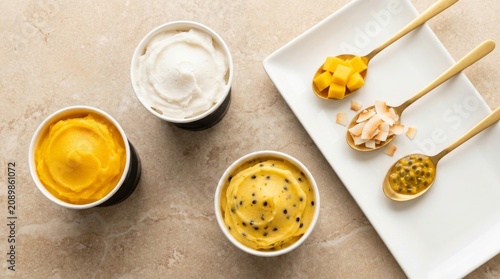 Tempting ice cream and sorbet adorned with fresh toppings set against a bright background