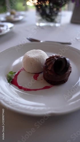 Chocolate Marquise with Artisan Ice Cream with an elegant table setting	
