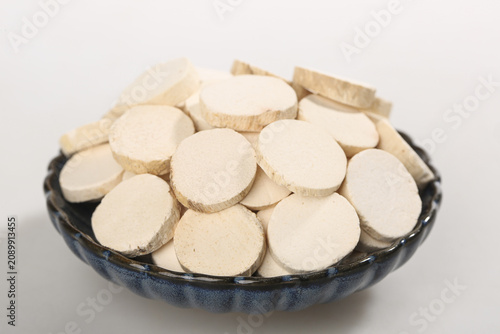 Sliced Chinese Yam Root Herbs in Bowl - Traditional Medicine Ingredient Studio Shot