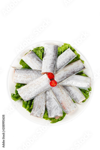 Fresh Striped Bass Fish Segments Plated with Lettuce Garnish Studio Food Photography