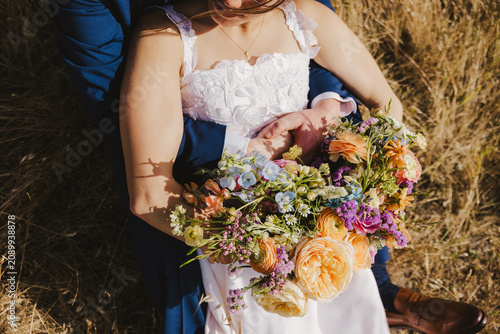 Bride and Groom in a Field