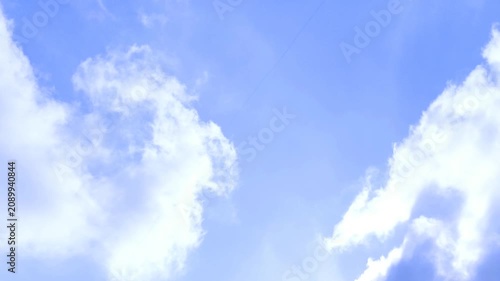 White Clouds Rising in Blue Sky Timelapse 4K